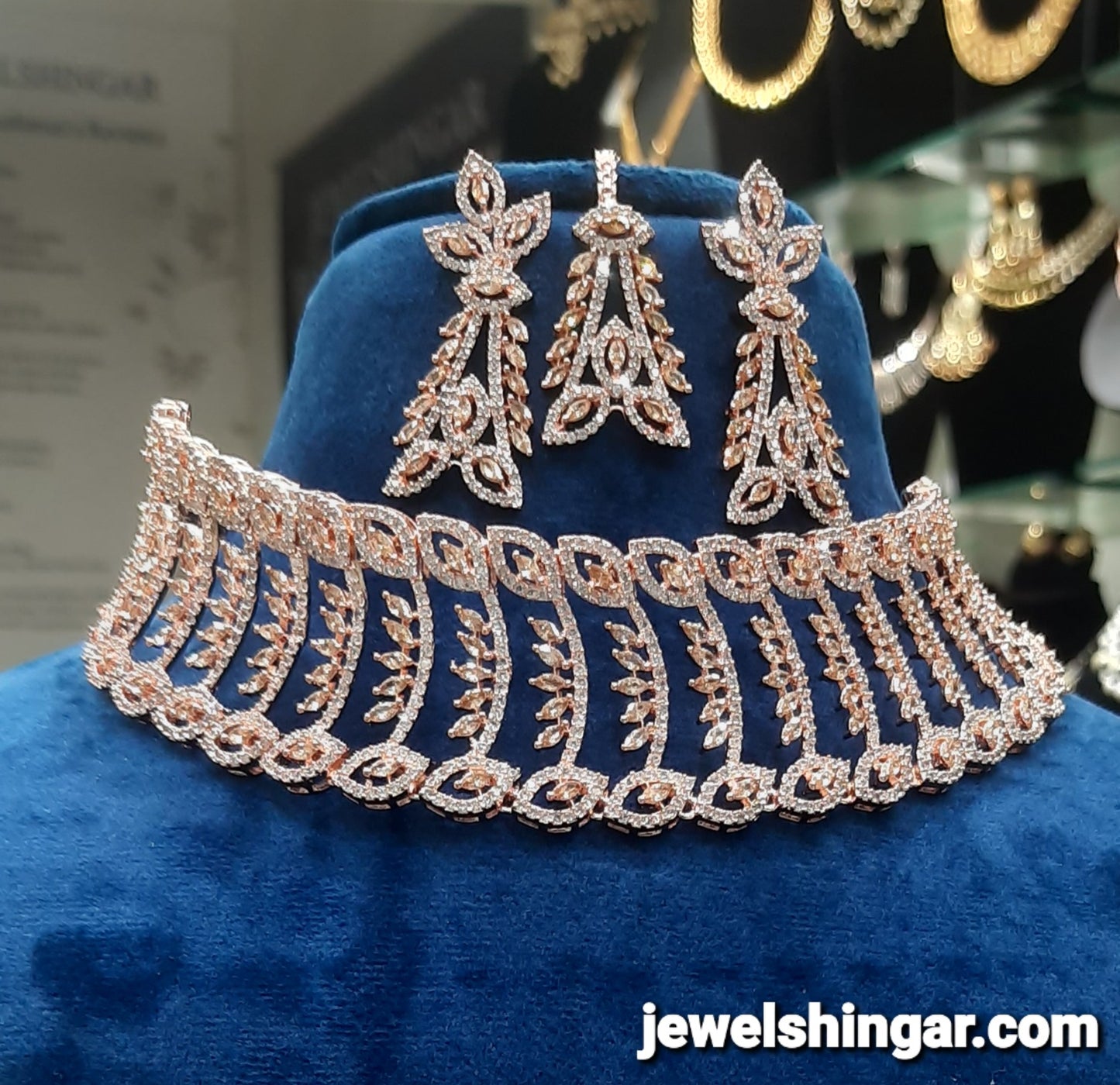 JEWELSHINGAR FINE ZIRCON ROSE GOLD PLATED DIAMOND LOOKING NECKLACE SET IN CHOKER STYLE WITH EARRINGS AND MAANGTIKKA FOR GIRLS (234042JS)
