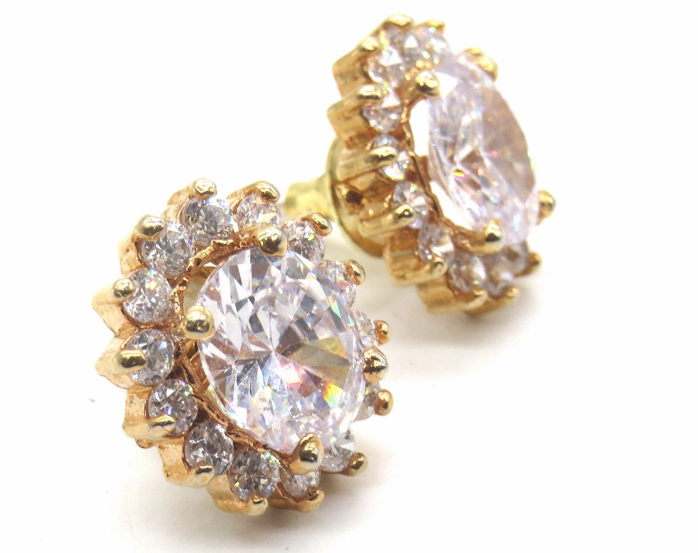 Jewelshingar Jewellery American Diamond PlatedGold Colour Stud Earrings For Women ( 55299GJT )