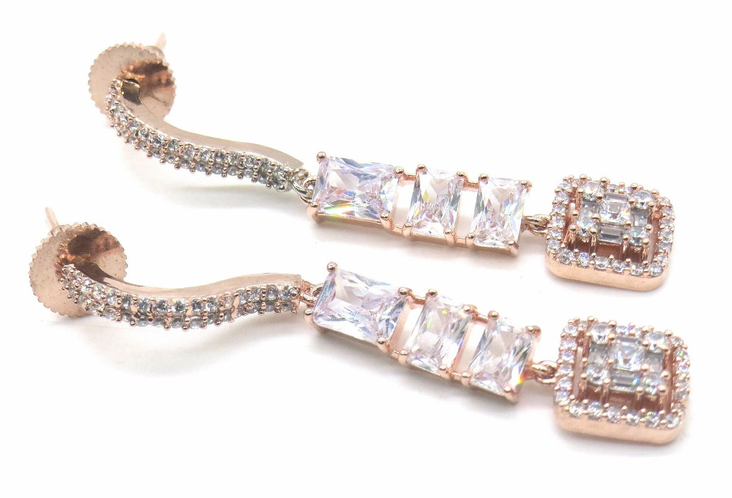 Jewelshingar Jewellery American Diamond PlatedRosegold Colour Stud Earrings For Women ( 55389EAD )