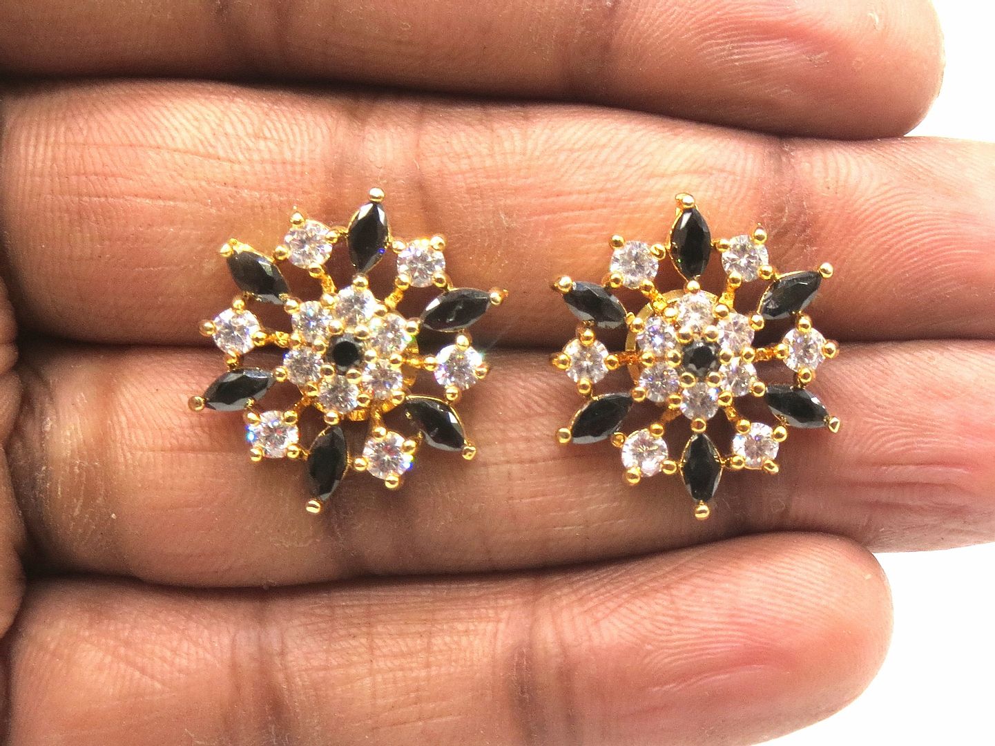 Jewelshingar Jewellery American Diamond PlatedGold Colour Stud Earrings For Women ( 55486GJT )