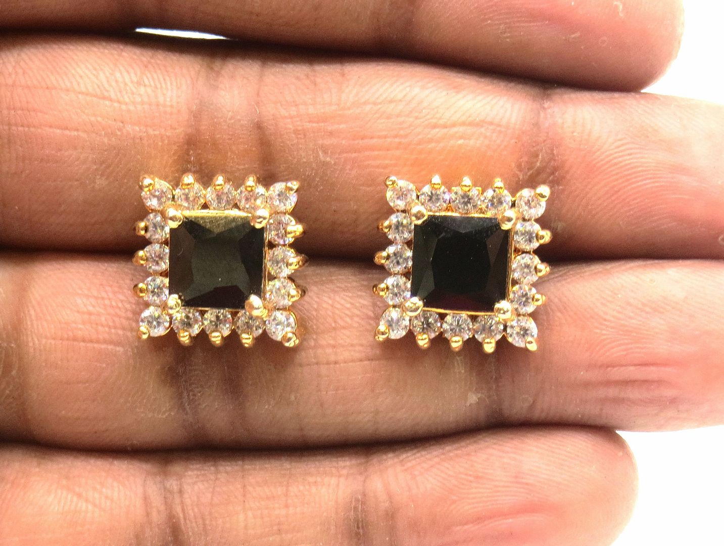 Jewelshingar Jewellery American Diamond PlatedGold Colour Stud Earrings For Women ( 55502GJT )