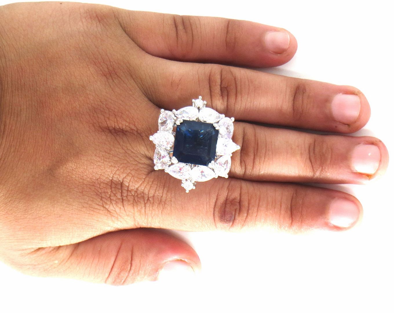 Jewelshingar Jewellery American Diamond Blue Colour Size Freesize Silver Plated  Ring For Girls ( 59728FSR )