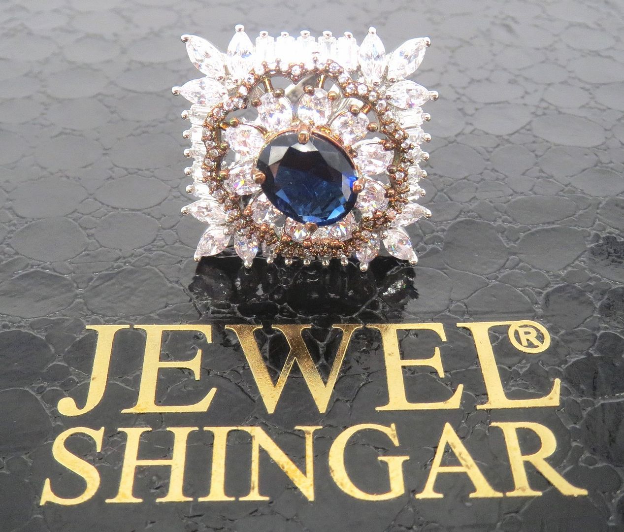 Jewelshingar Jewellery American Diamond Blue Colour Size Freesize Rose Gold Silver Plated  Ring For Girls ( 59856FSR )