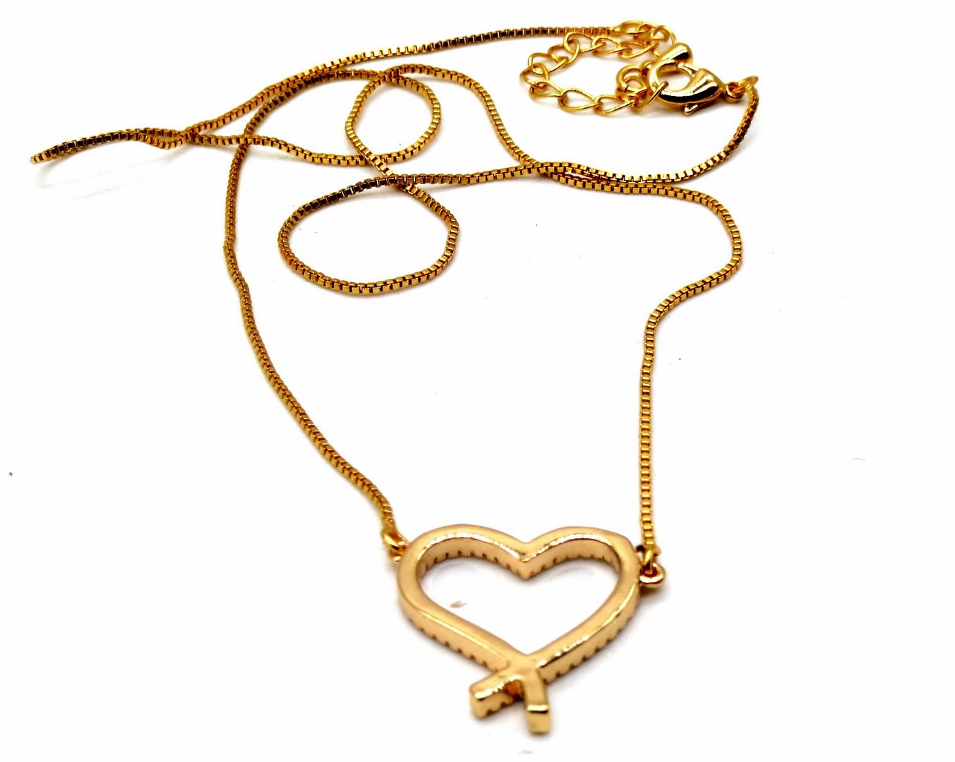 Jewelshingar Jewellery Rosegold Plated Diamond Looking Pendant with Golden Tanmaniya chain For Women ( 92147MST )