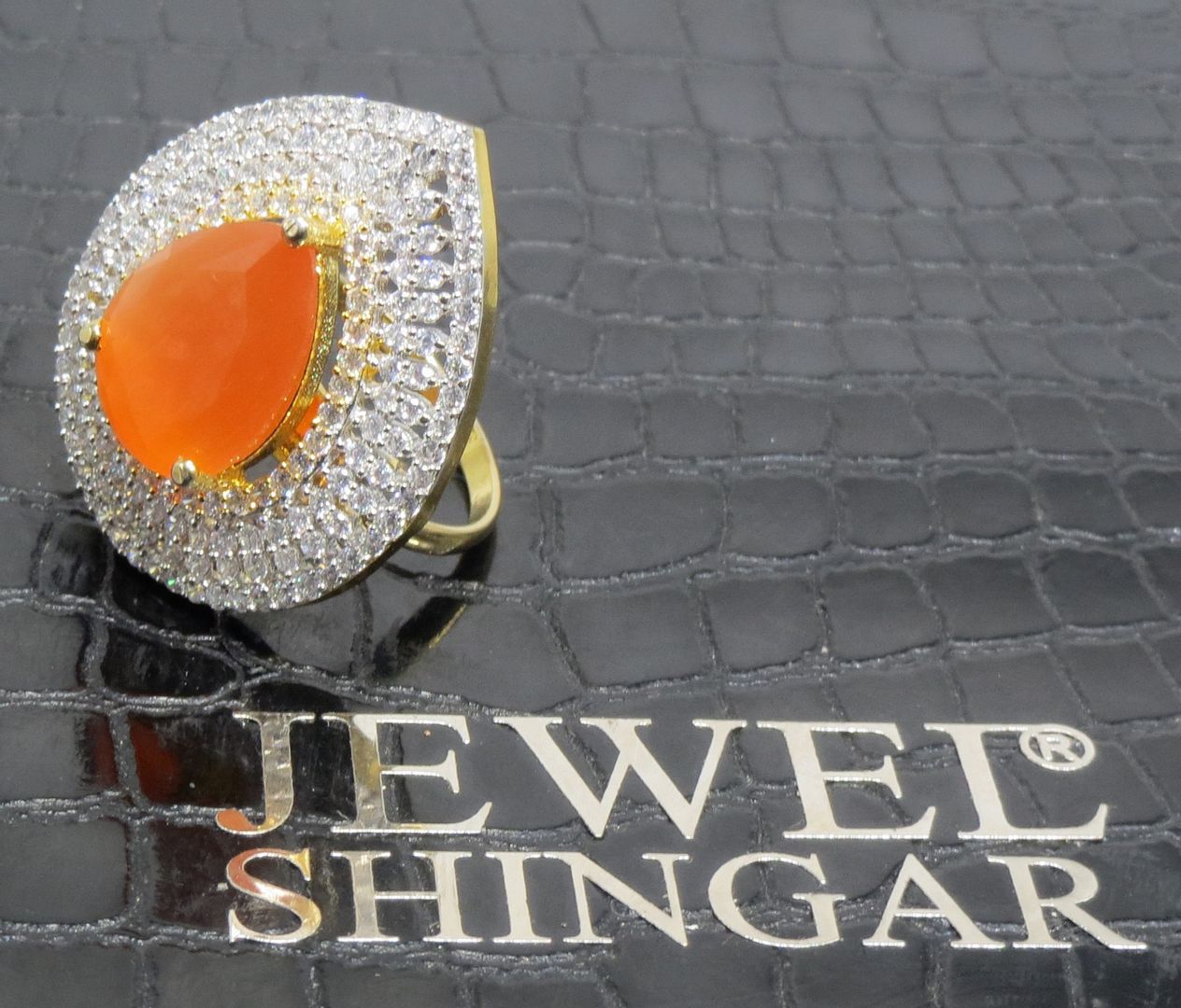Jewelshingar Jewellery American Diamond Orange Colour Size Freesize Gold Plated  Ring For Girls ( 93574FSR )