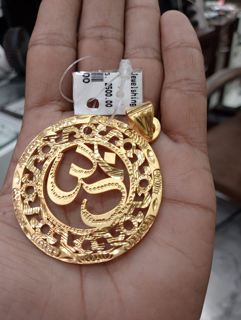 GOLD FORMING 2 INCH OM PENDANT BY CHOKERSET P7654393